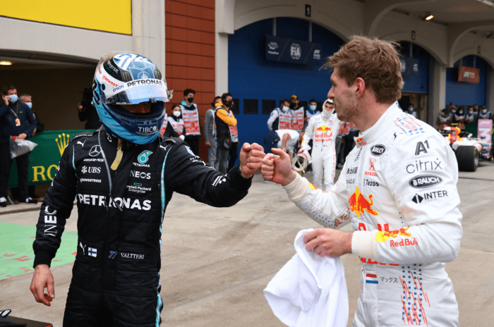 Valtteri Bottas and Max Verstappen fist bump after the race.