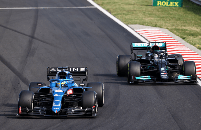 Fernando Alonso and Lewis Hamilton battle at the Hungarian Grand Prix.